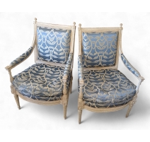 Paire de fauteuils Louis XVI laqués blanc