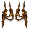 Paire d'appliques en bois sculpté doré à 3 lumière