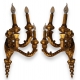 Paire d'appliques en bois sculpté doré à 3 lumière
