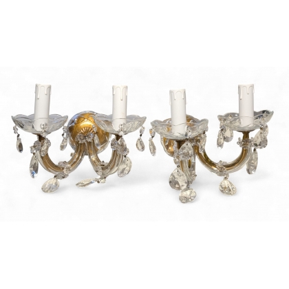 A pair of two-light glass wall lights