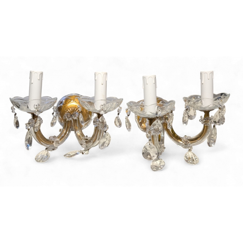 A pair of two-light glass wall lights