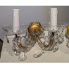 A pair of two-light glass wall lights