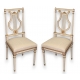 Paire de chaises lyre style Louis XVI laquées