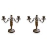 Pair of Louis XVI-style candlesticks. Available from Moinat SA – Antiques and home décor