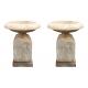 Paire de vasques évasées sur socles en pierre