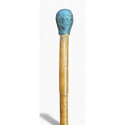 Self-defence cane made of reed with a lead pommel