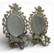 Paire d'appliques miroir ovales en bronze