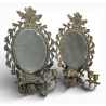 Paire d'appliques miroir ovales en bronze