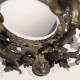 Paire d'appliques miroir ovales en bronze