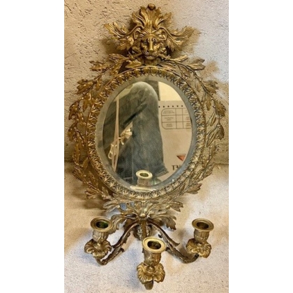 Paire d'appliques miroir ovales en bronze
