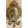 Paire d'appliques miroir ovales en bronze