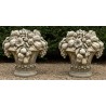 A pair of carved stone fruit bowls