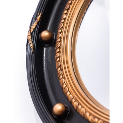 Miroir rond convex en résine noire et dorée