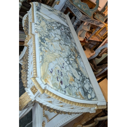 A richly carved Louis XVI-style console table by Moinat SA – Antiques and home décor