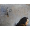 Tableau \"Femme à la laine\" signé