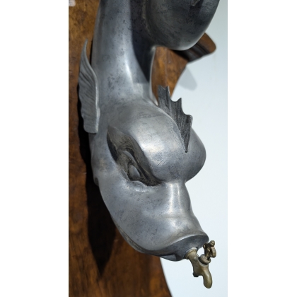 Wall-mounted pewter fish fountain, with an oak frame