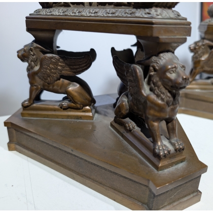 A pair of bronze candlesticks signed B. BOSCHETTI