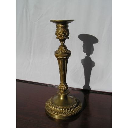  Paire de bougeoirs Louis XVI en bronze sur  Moinat SA  - Antiquités décoration