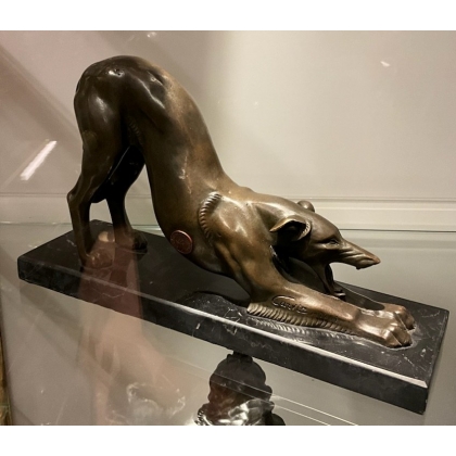 Bronze Borzoi stretching, on a black marble plinth