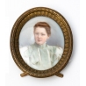 Miniature ovale sur porcelaine "Jeune fille"