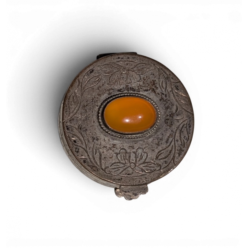 Small round box with an orange cabochon