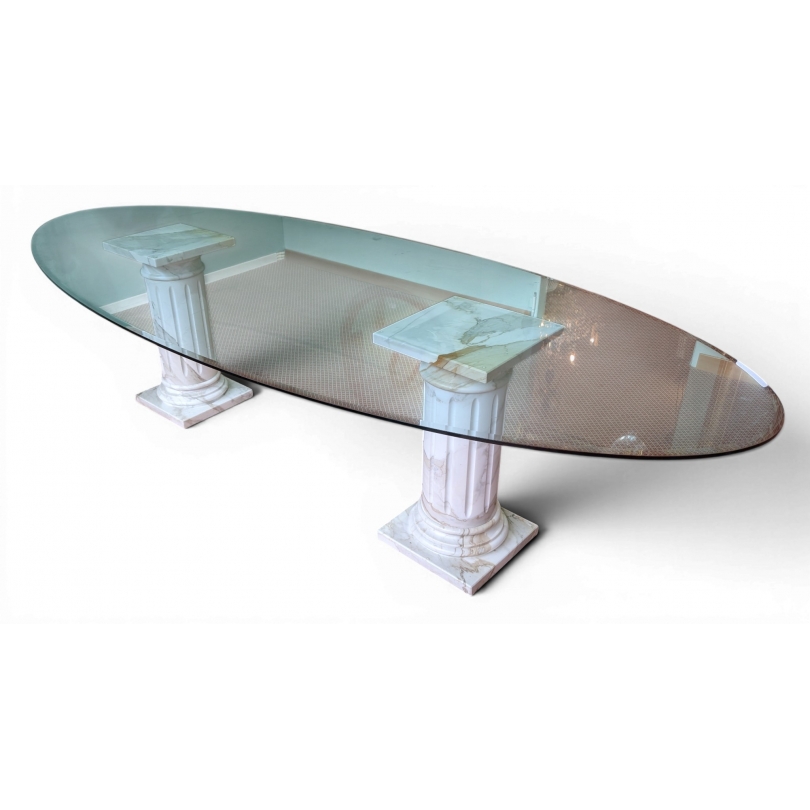 Table ovale plateau verre et colonnes marbre