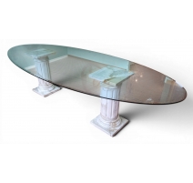 Table ovale plateau verre et colonnes marbre