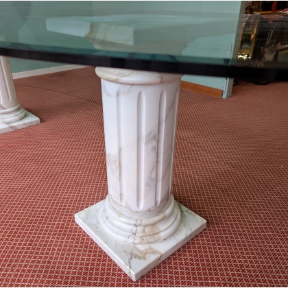 Table ovale plateau verre et colonnes marbre