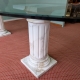 Table ovale plateau verre et colonnes marbre