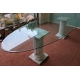 Table ovale plateau verre et colonnes marbre