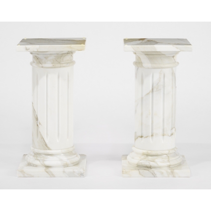 Table ovale plateau verre et colonnes marbre