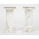 Table ovale plateau verre et colonnes marbre