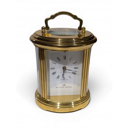 Oval clock by Matthew NORMAN