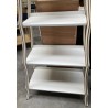 Open bookcase painted white and gold