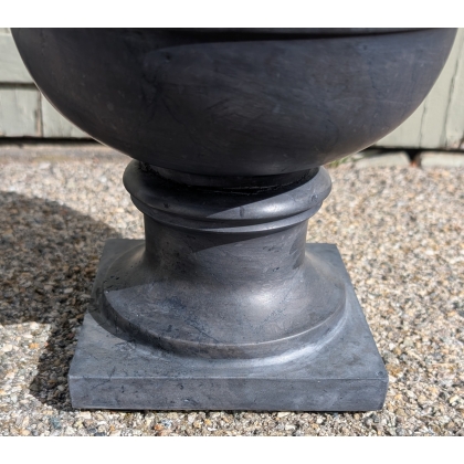 Black marble-effect stone garden basin
