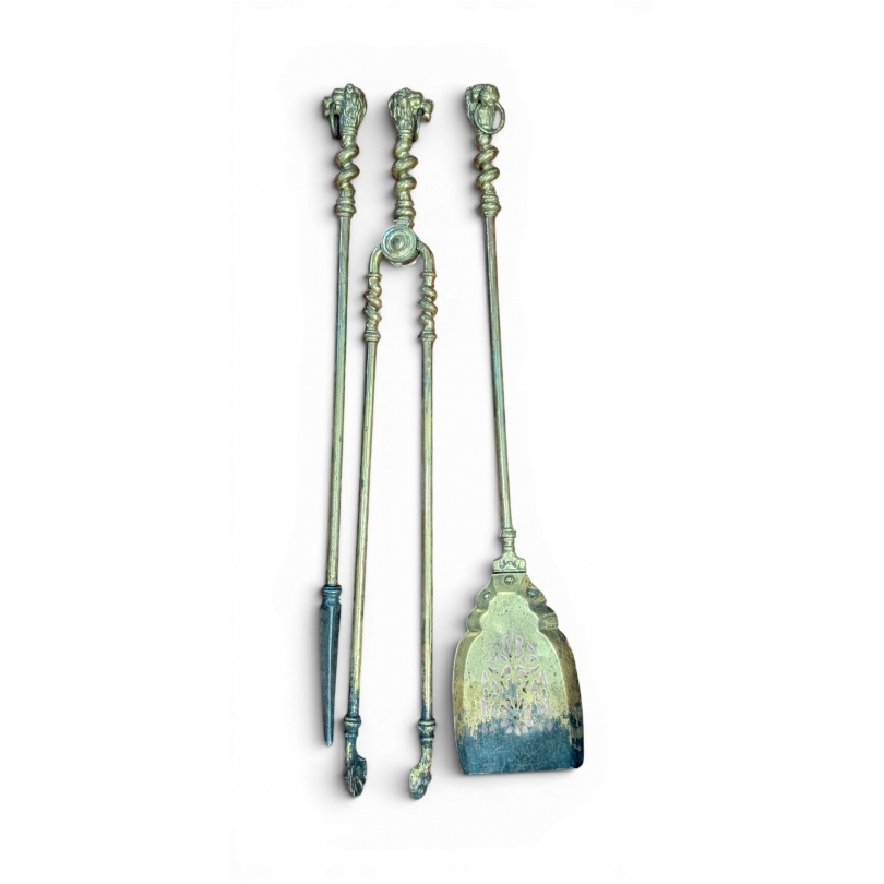 Lot d'outils de cheminée en bronze "Tête de lion"