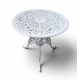 Table ronde en fonte d'alu ajourée blanche