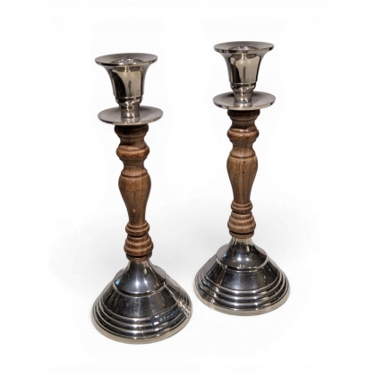 A pair of wooden and chrome-plated metal candlesticks