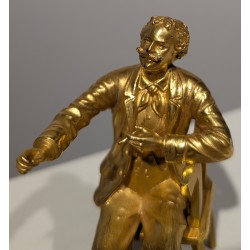 Bronze doré Homme assis fumant
