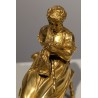 Bronze doré Femme assise fillant