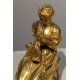 Bronze doré Femme assise fillant