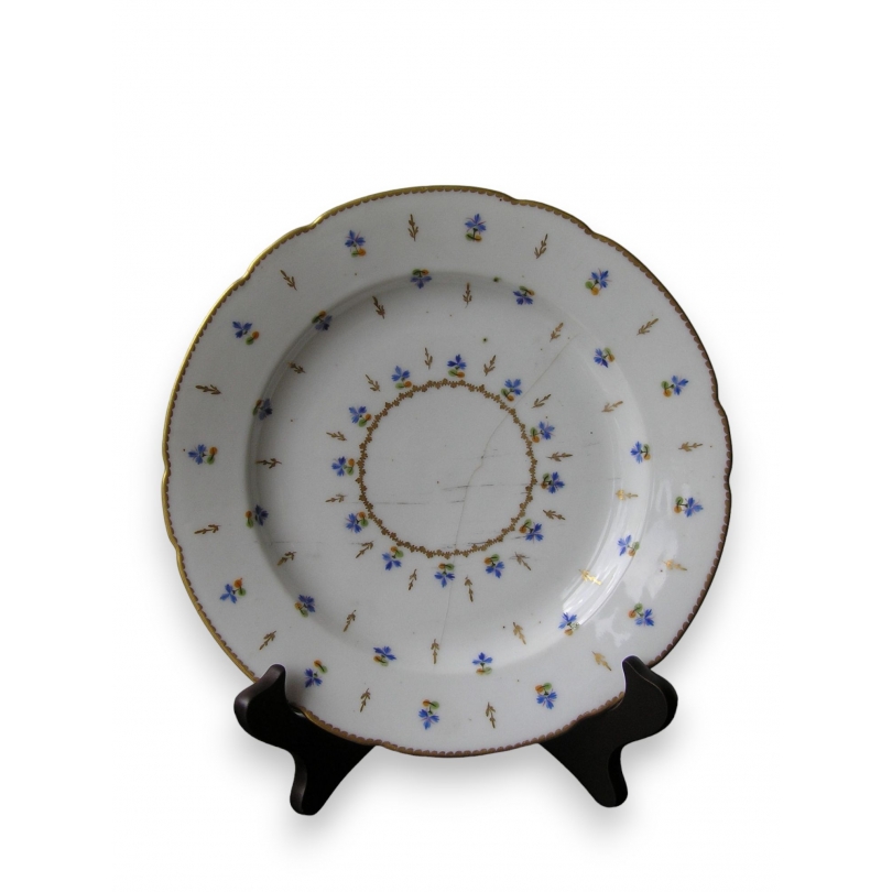  Assiette en porcelaine de Nyon (cheveu) sur  Moinat SA  - Antiquités décoration