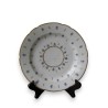  Assiette en porcelaine de Nyon (cheveu) sur  Moinat SA  - Antiquités décoration