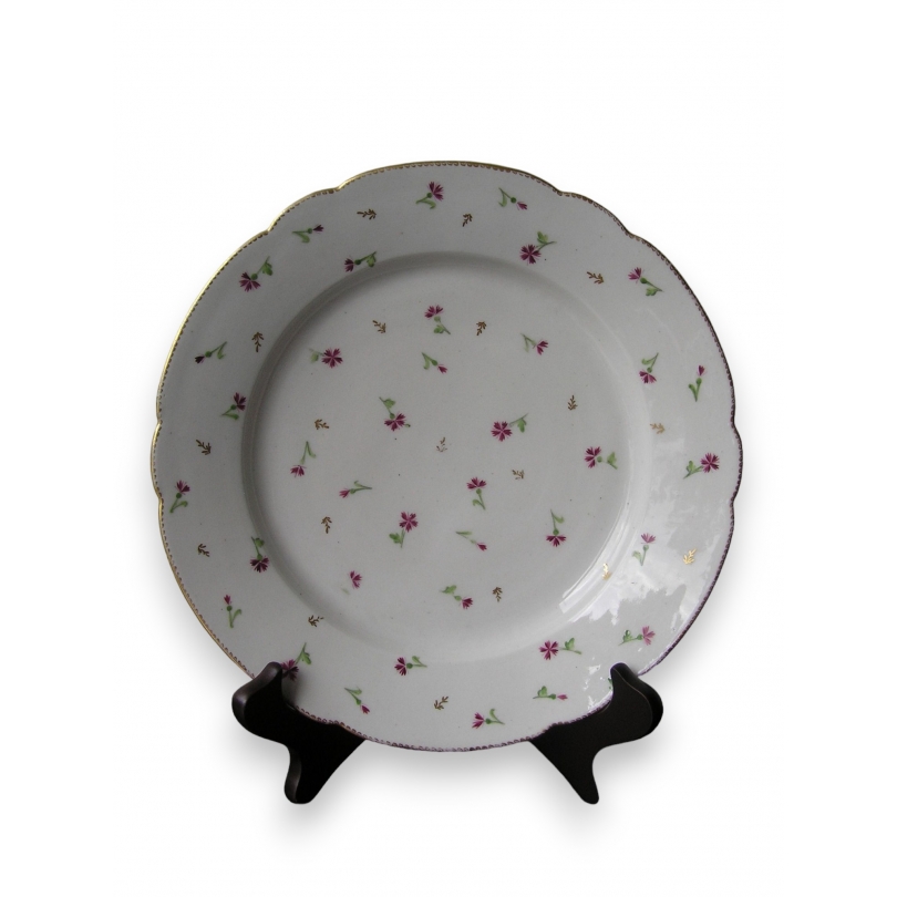  Assiette en porcelaine de Nyon sur  Moinat SA  - Antiquités décoration