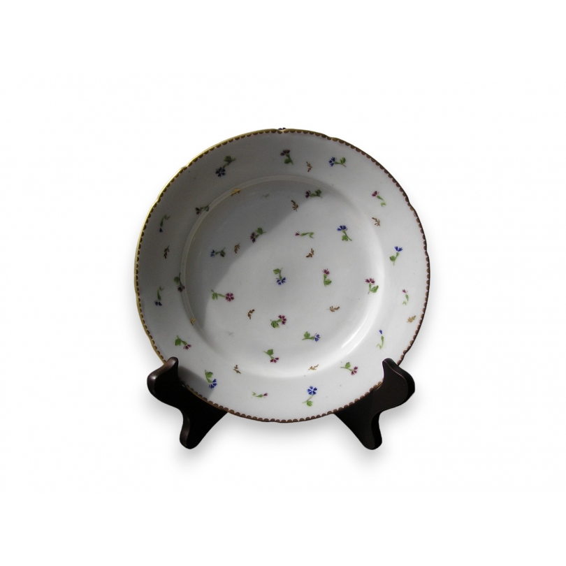  Assiette en porcelaine de Nyon, sur  Moinat SA  - Antiquités décoration