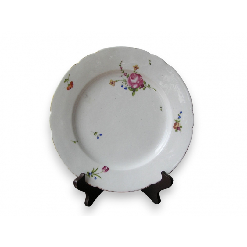  Assiette en porcelaine de Nyon sur  Moinat SA  - Antiquités décoration