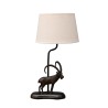Lampe Bouquetin en laiton et abat-jour en lin