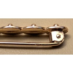 Broche en or