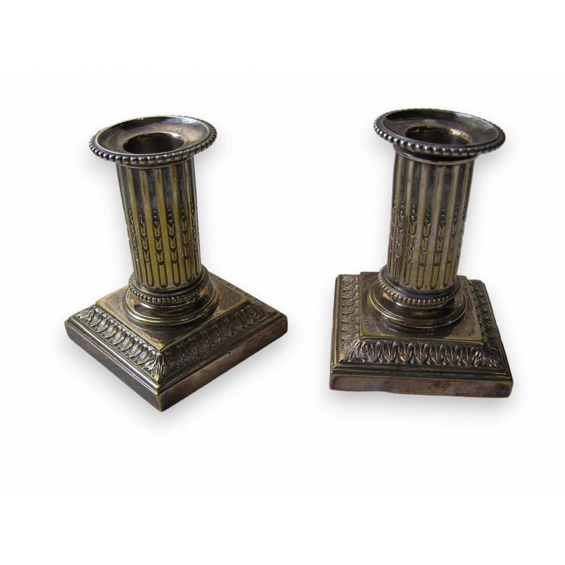 Pair of silver-plated metal candlesticks by Moinat SA – Antiques and home décor