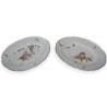 Paire d\'assiettes ovales en porcelaine